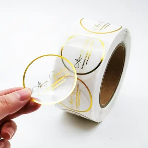 Custom Logo Waterproof Vinyl Clear Circle Gold Foil Label Roll Adhesive Transparent Logo Sticker