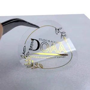 Customized Transparent Gold Foil Adhesive Sticker Waterproof Round Label for Cosmetic Product Packaging and Seal